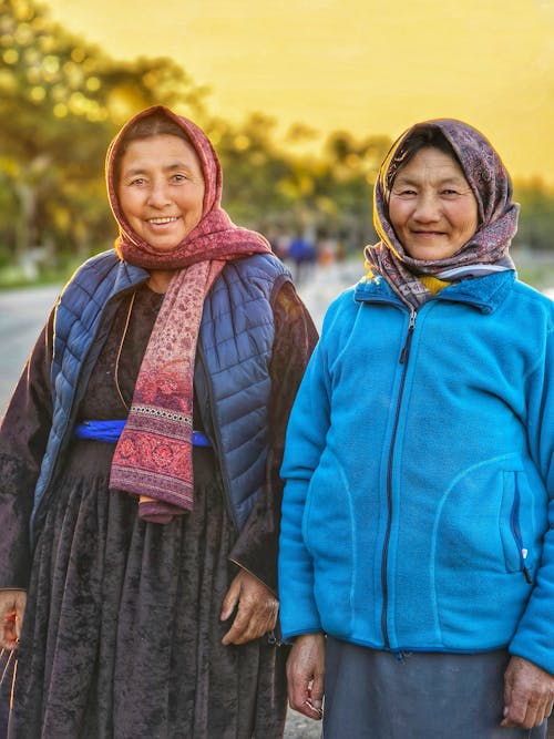 Portrait of Smiling Women in Shawls
