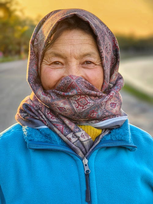 A woman with a scarf on her head