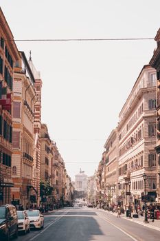 Picturesque street in Rome, Italy, showcasing historic architecture and bustling urban life.
