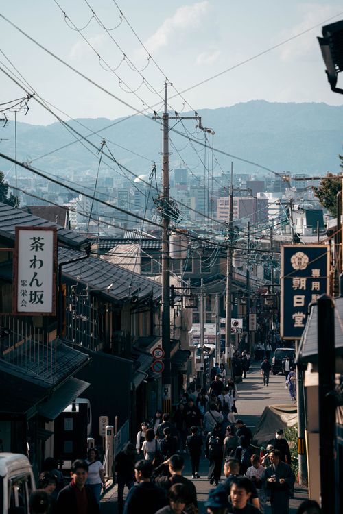 Free Crowded street in Osaka, Japan with pedestrians and traditional architecture. Stock Photo