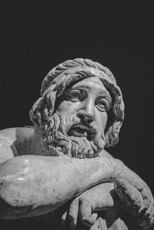 A black and white photo of a statue