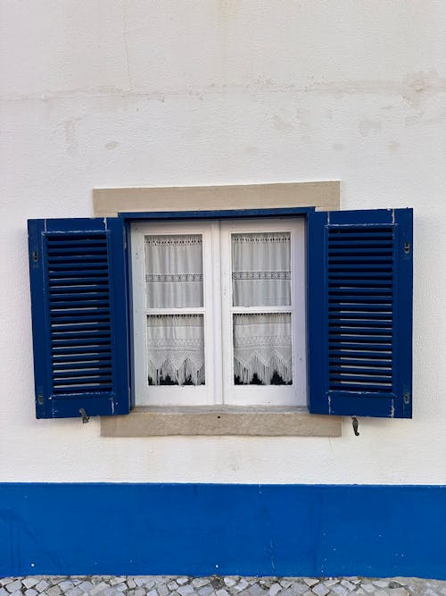 Free A Window With Opened Shutters Stock Photo