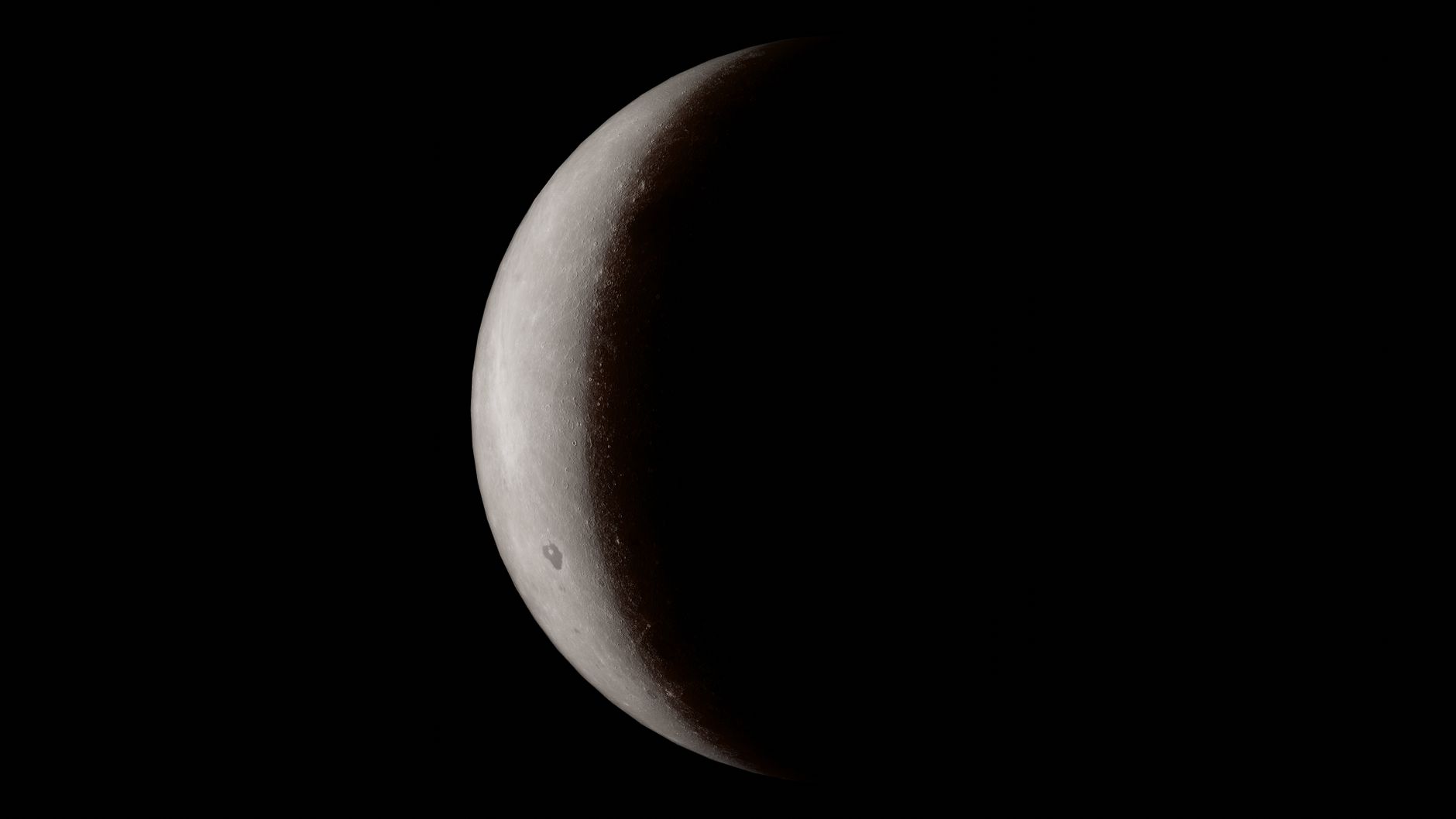 A detailed close-up of a crescent moon against a deep black space background.