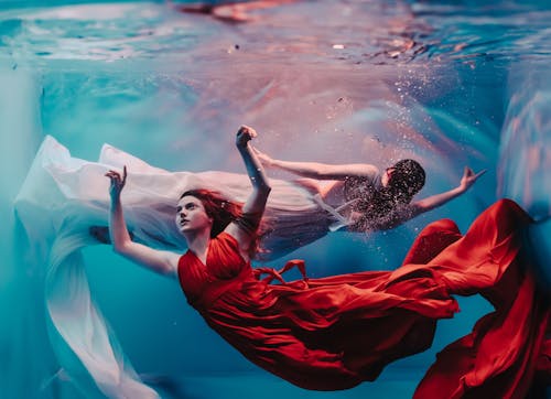 Women in Dresses Diving