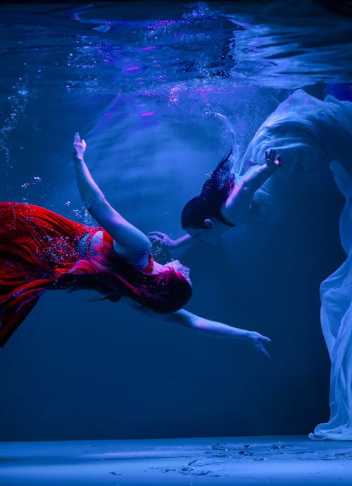 Models in Dresses Diving