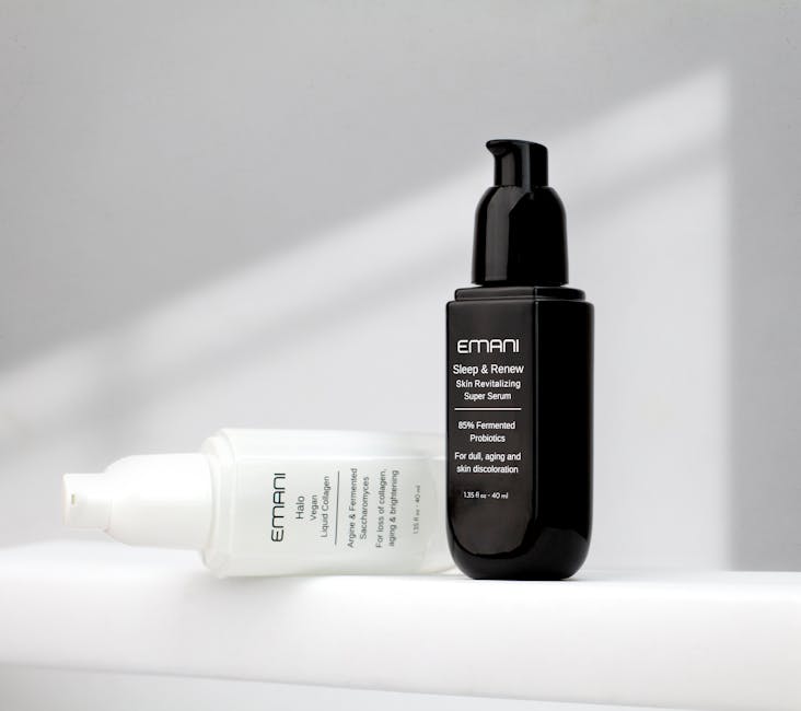 Studio shot of Emani skincare serums on a white background showcasing luxury beauty products.