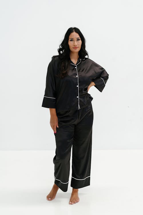 Free Woman Standing in Black Pajama Stock Photo