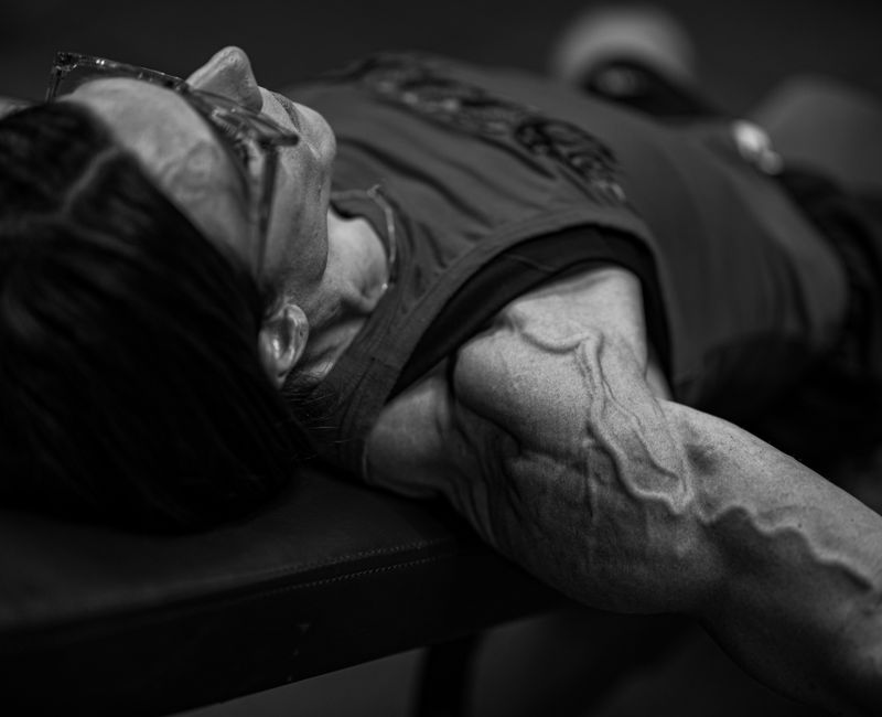 A close-up of athletic performance patches displayed on a gym bench