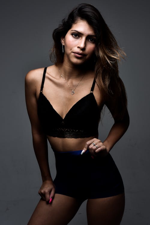 Studio Shot of a Young Woman in Black Underwear 