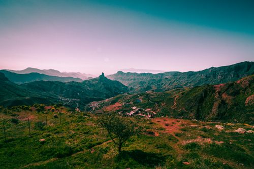 Free Scenic landscape of Roque Bentayga in Gran Canaria, showcasing vibrant mountains and lush valleys. Stock Photo