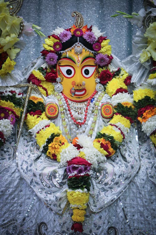 A statue of the goddess durga is displayed