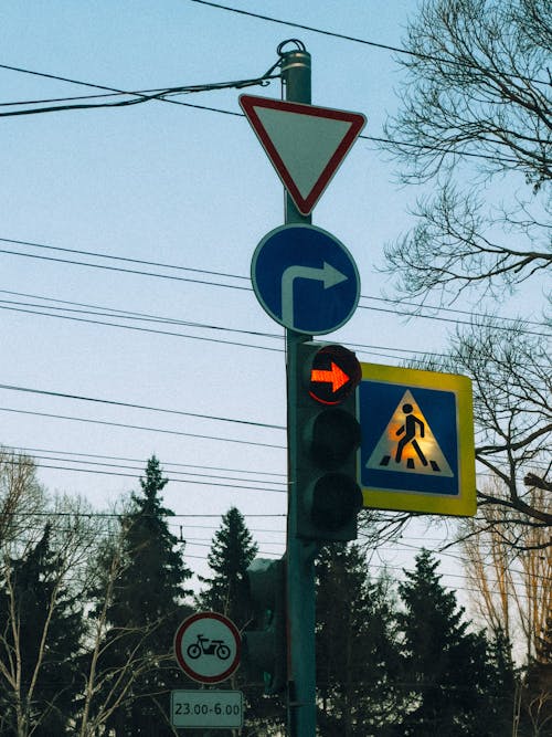 A traffic light with a sign that says stop