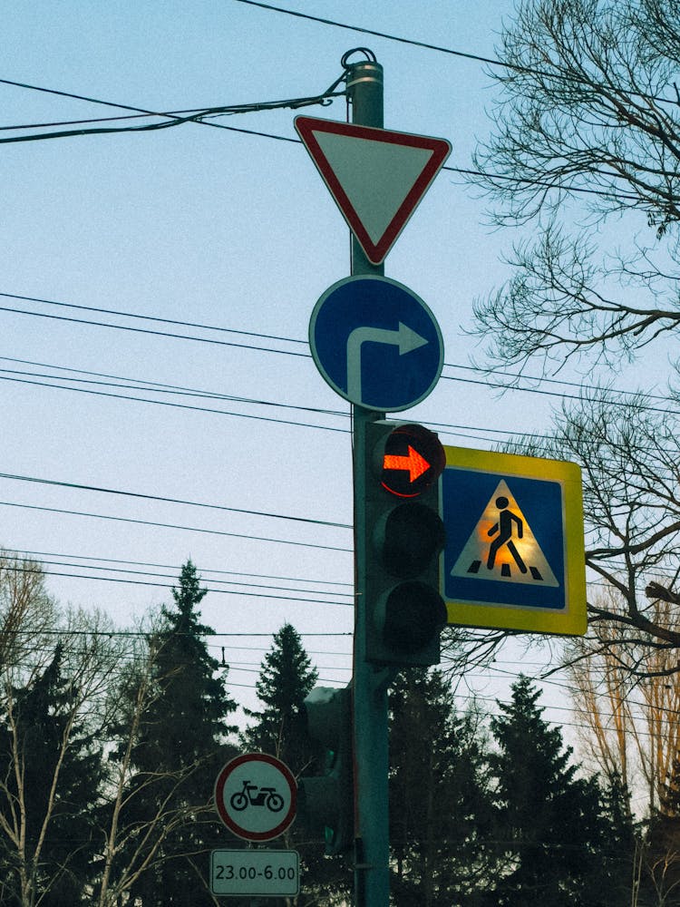 European Traffic Lights And Signs With Cables Over Street