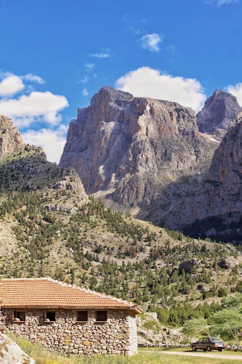 Stone Building in a Rocky Valley 