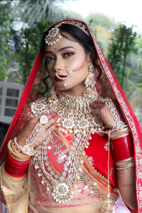 A beautiful indian bride in red and gold