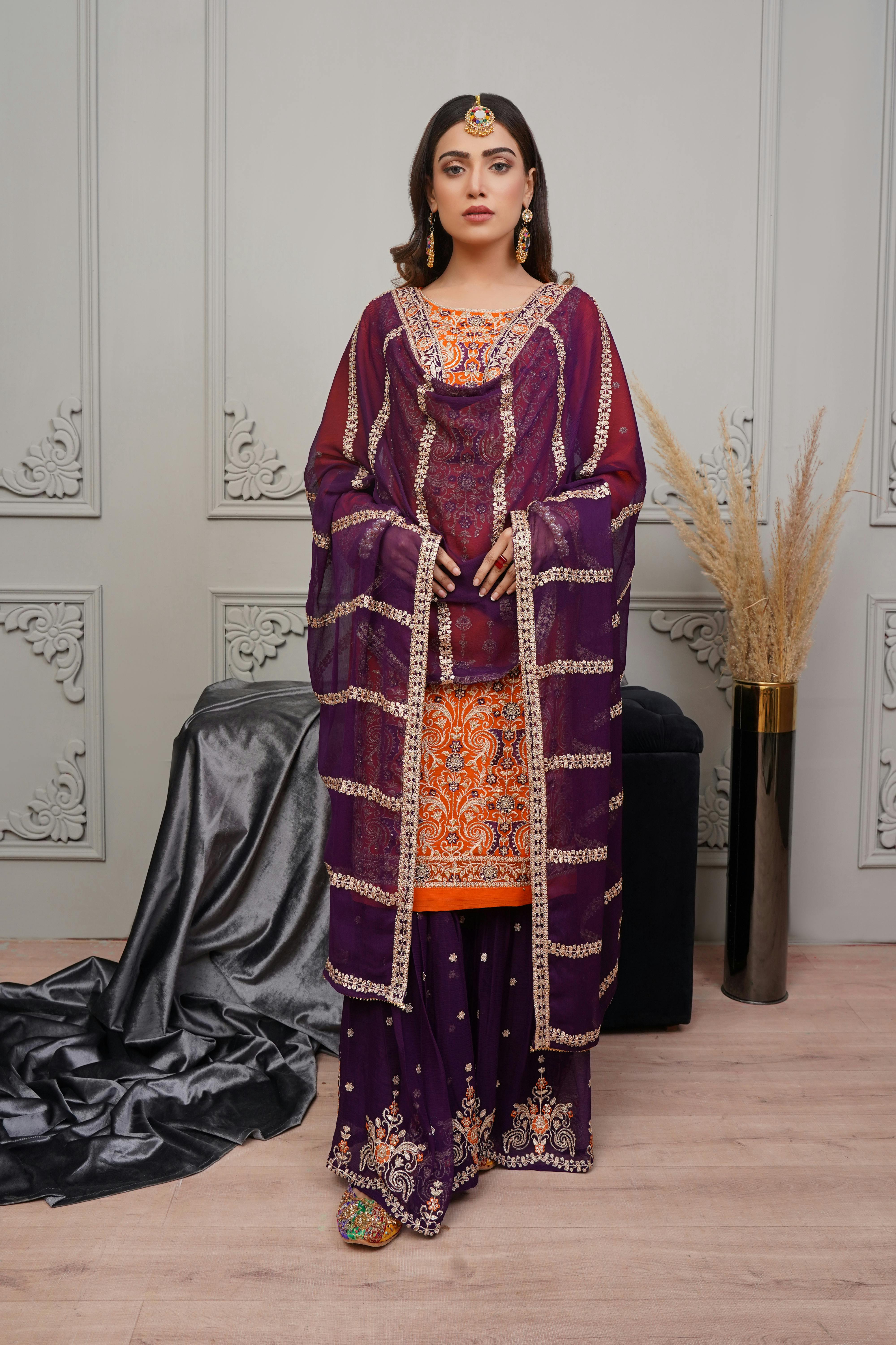 woman standing in traditional dress