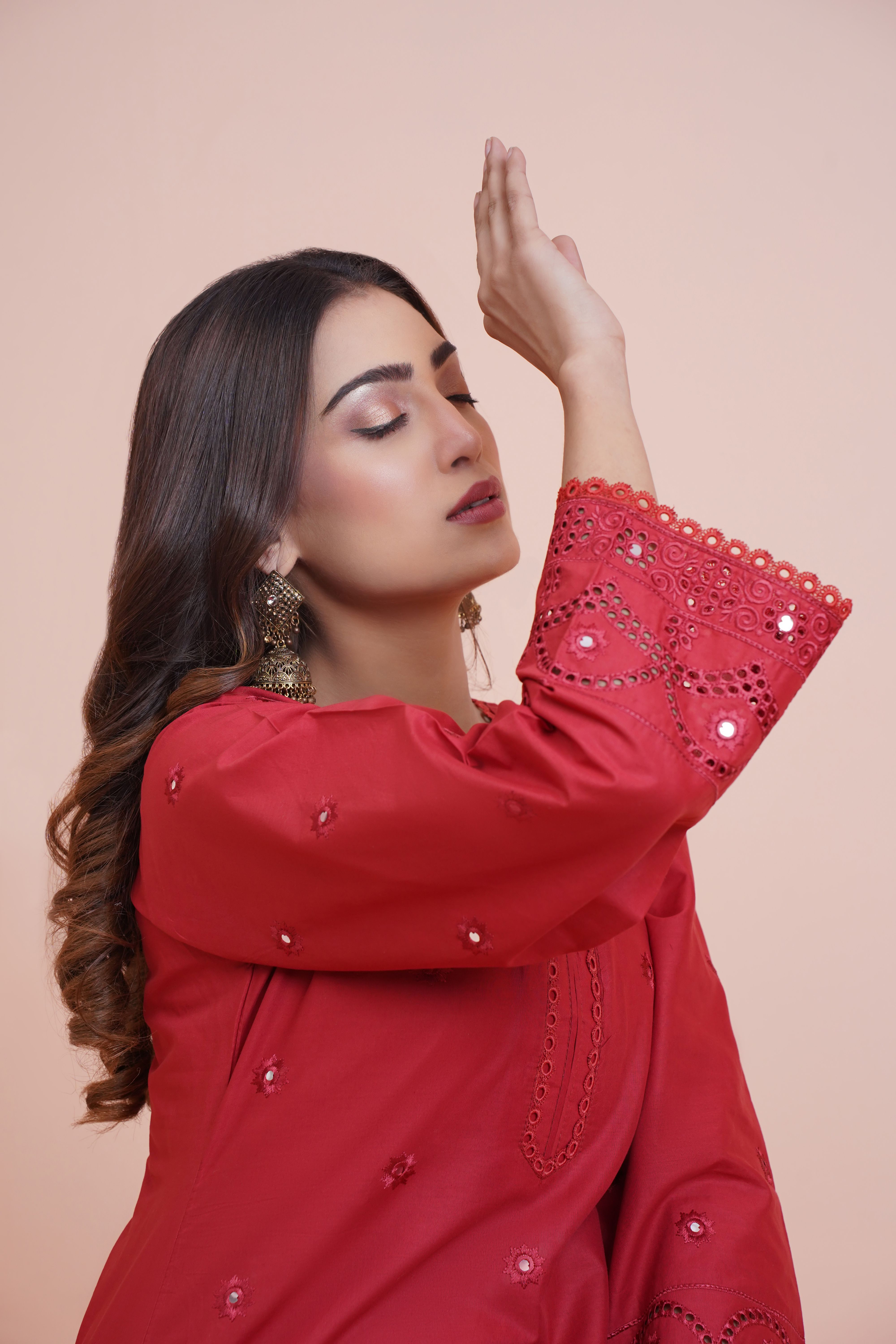 Portrait of a Woman in a Traditional Red Dress · Free Stock Photo
