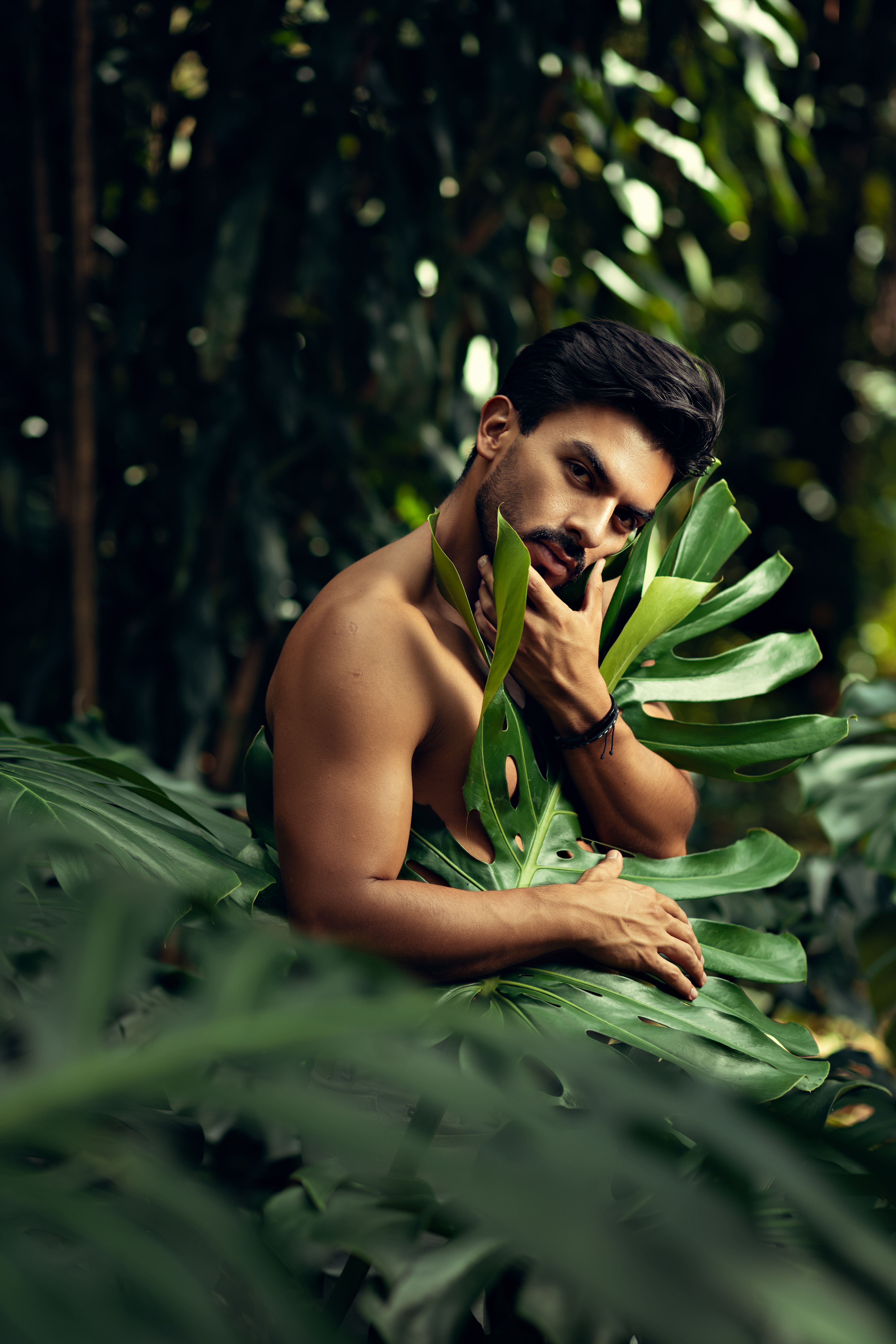 Muscular Shirtless Man Wrapped in Leaf · Free Stock Photo