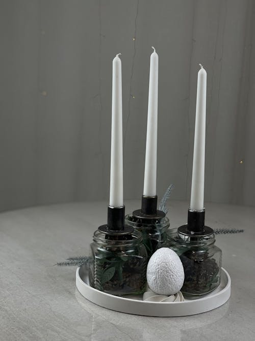 Wax Candles and Egg on Tray