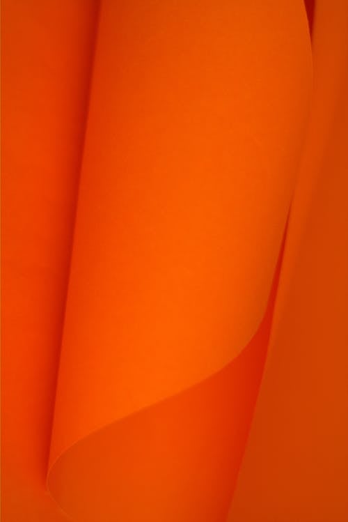 An orange paper with a white background