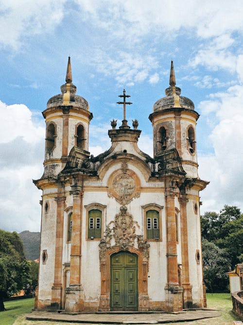 A church with two towers and a green roof