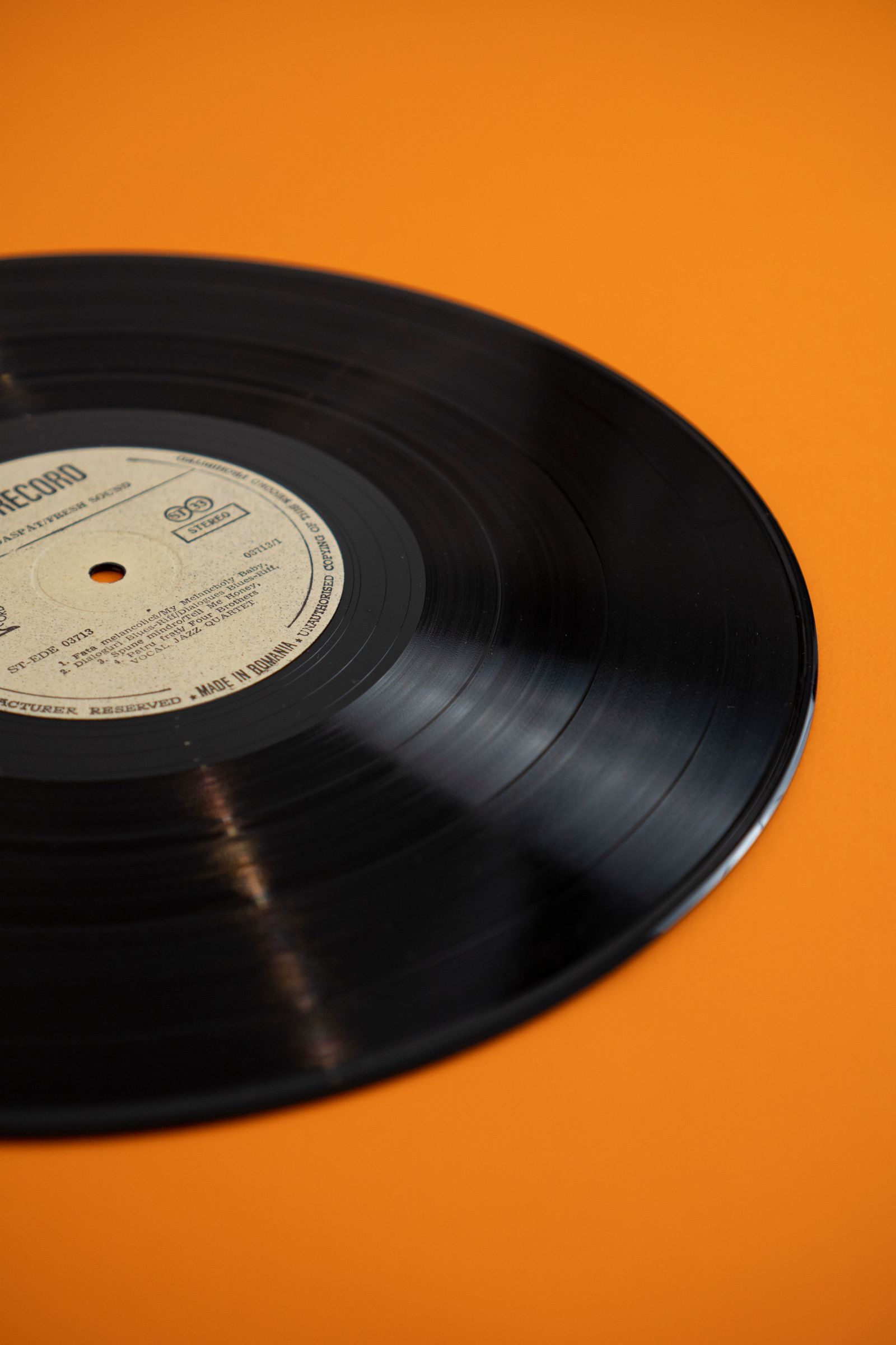 Vinyl record on an orange background
