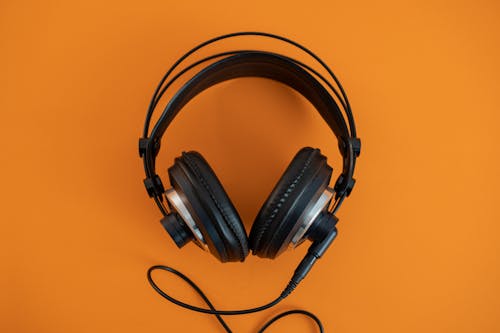 Headphones on an orange background