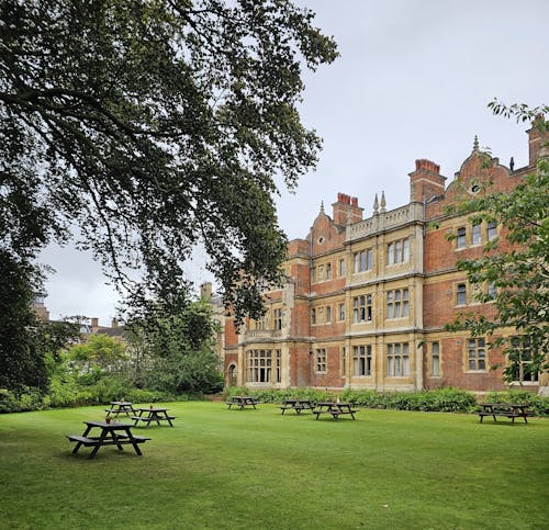 A large building with a lawn in front of it