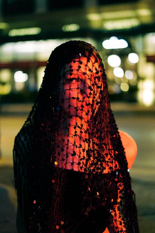 Portrait of Woman in Veil at Night