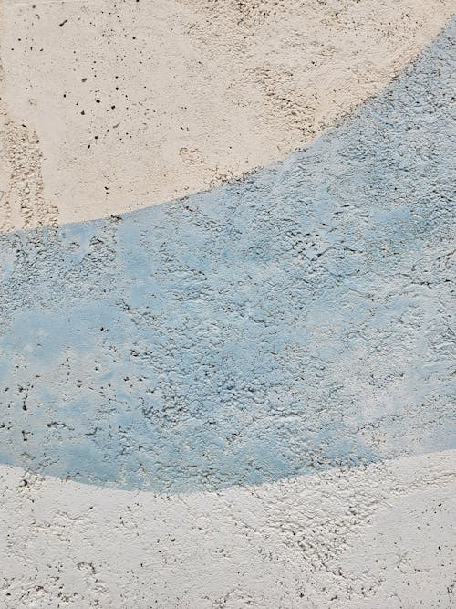 A blue and white abstract wall painting