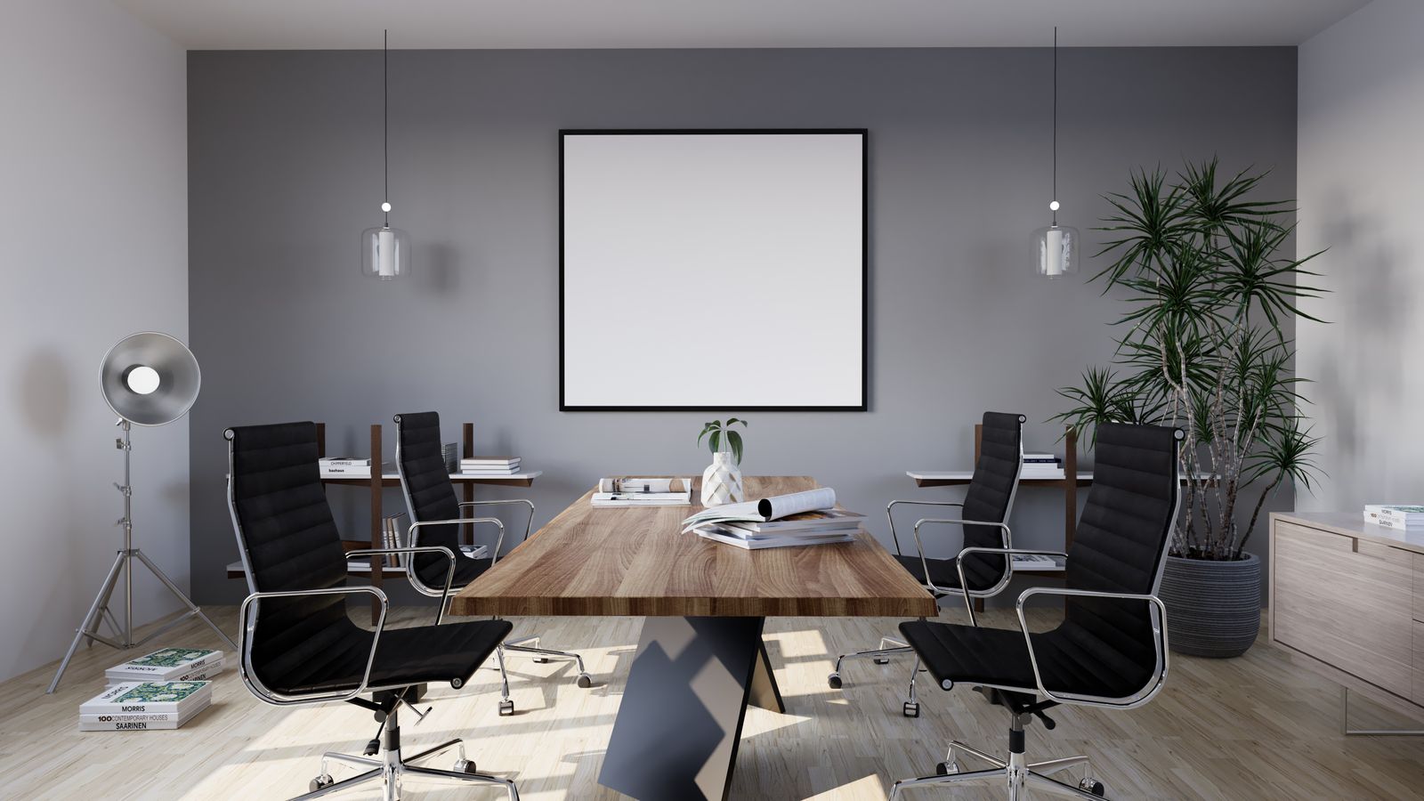 Minimalist conference room with a long table and chairs