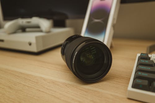 A camera lens sitting on top of a desk