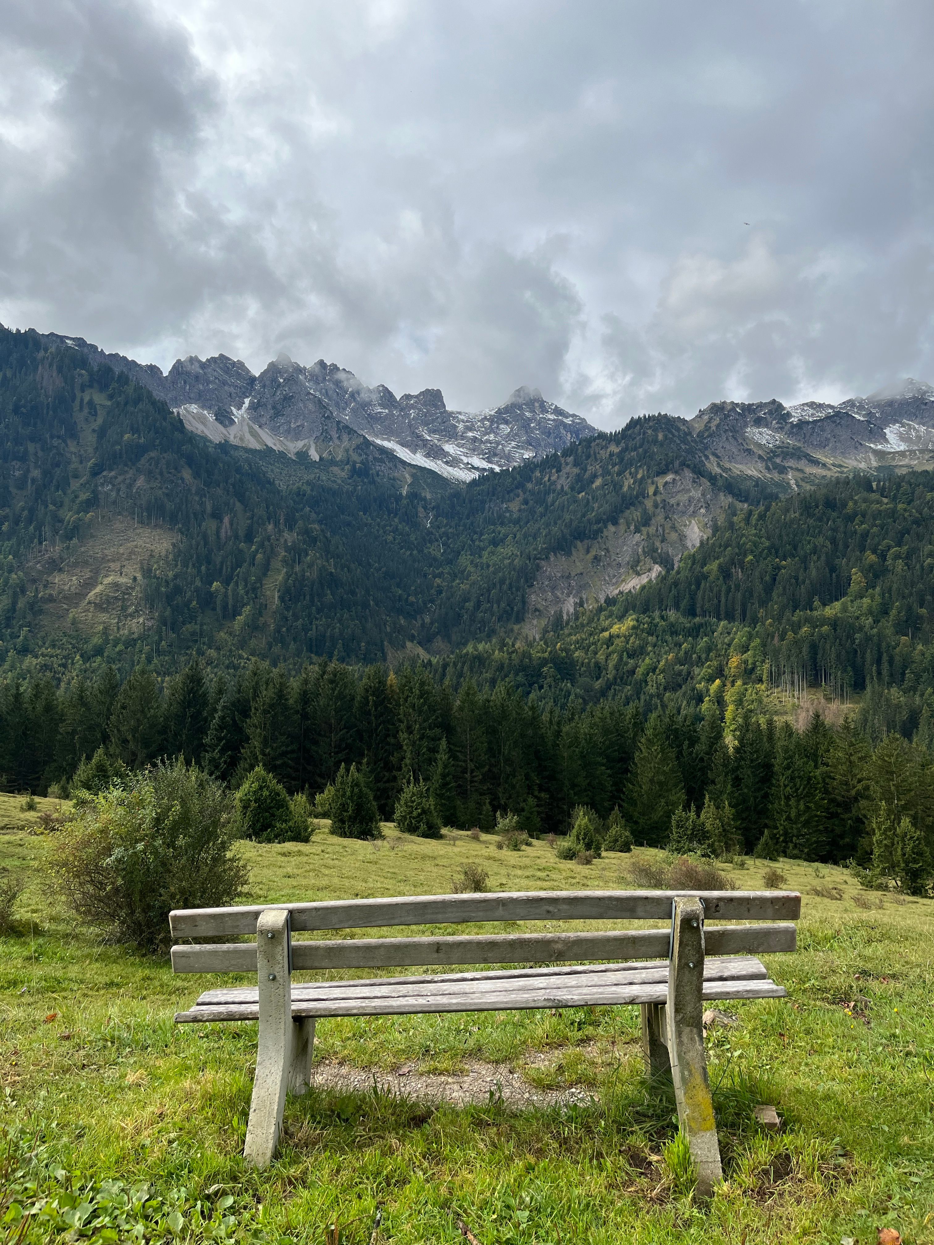 Wooden Bench with Mountains Landscape behind · Free Stock Photo