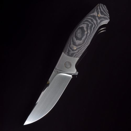 Free Close-up of a Damascus steel knife showcasing detailed blade patterns on black background. Stock Photo