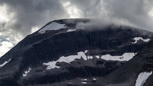 A dark black mountain in Norway in the Trollheimen.