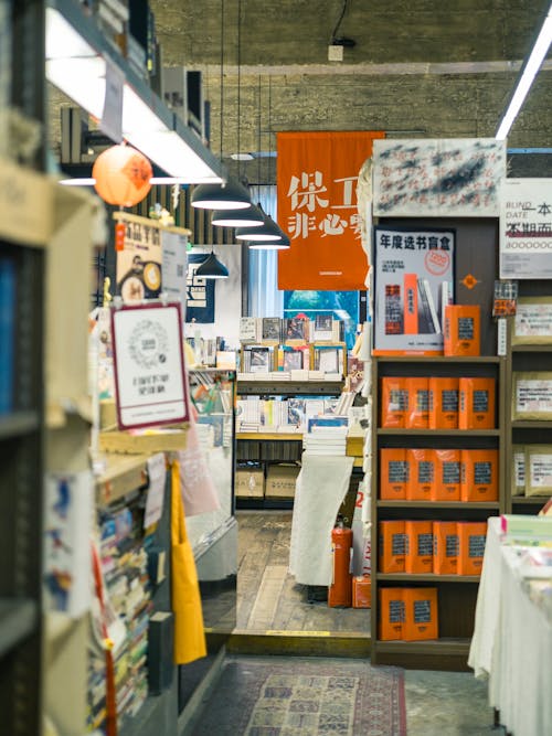 A bookstore with books and magazines on shelves