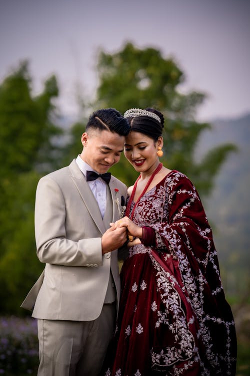 A bride and groom in traditional attire