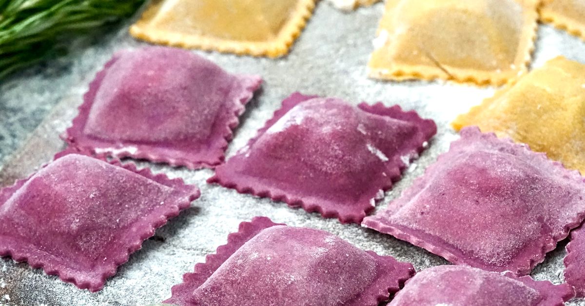 Close-up of Raw, Colorful Ravioli Lying on a Countertop · Free Stock Photo