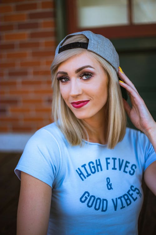 Portrait of Blonde Woman in Cap