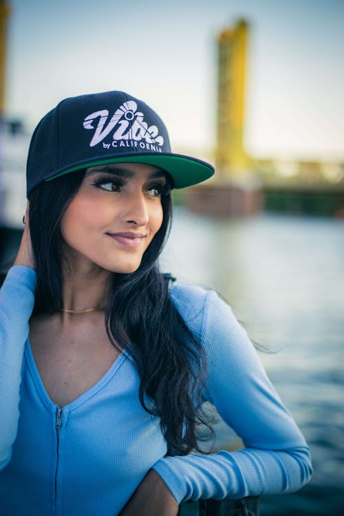 Smiling Woman in Cap