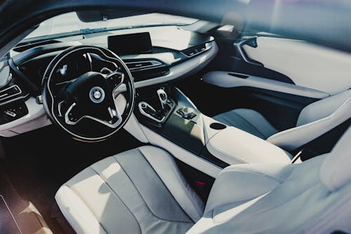 The interior of a bmw car with leather seats