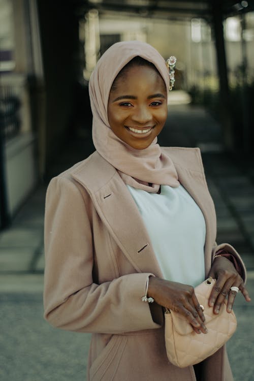 Smiling Woman in Suit and Hijab