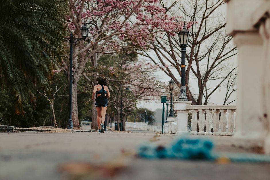 woman jogging sunrise park