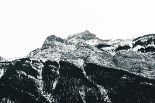 Breathtaking view of snow-covered mountains in Banff National Park, Alberta.
