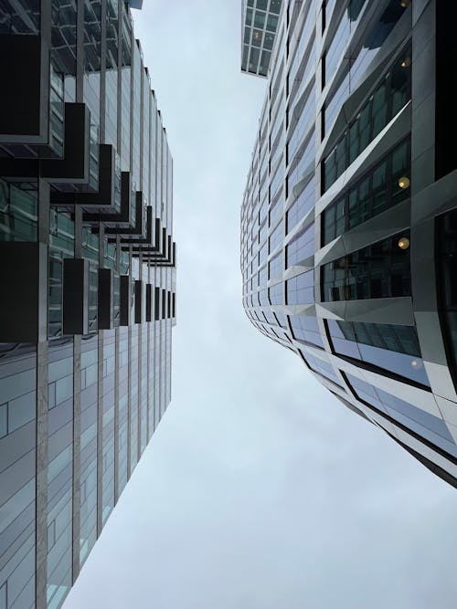 A view of tall buildings from below