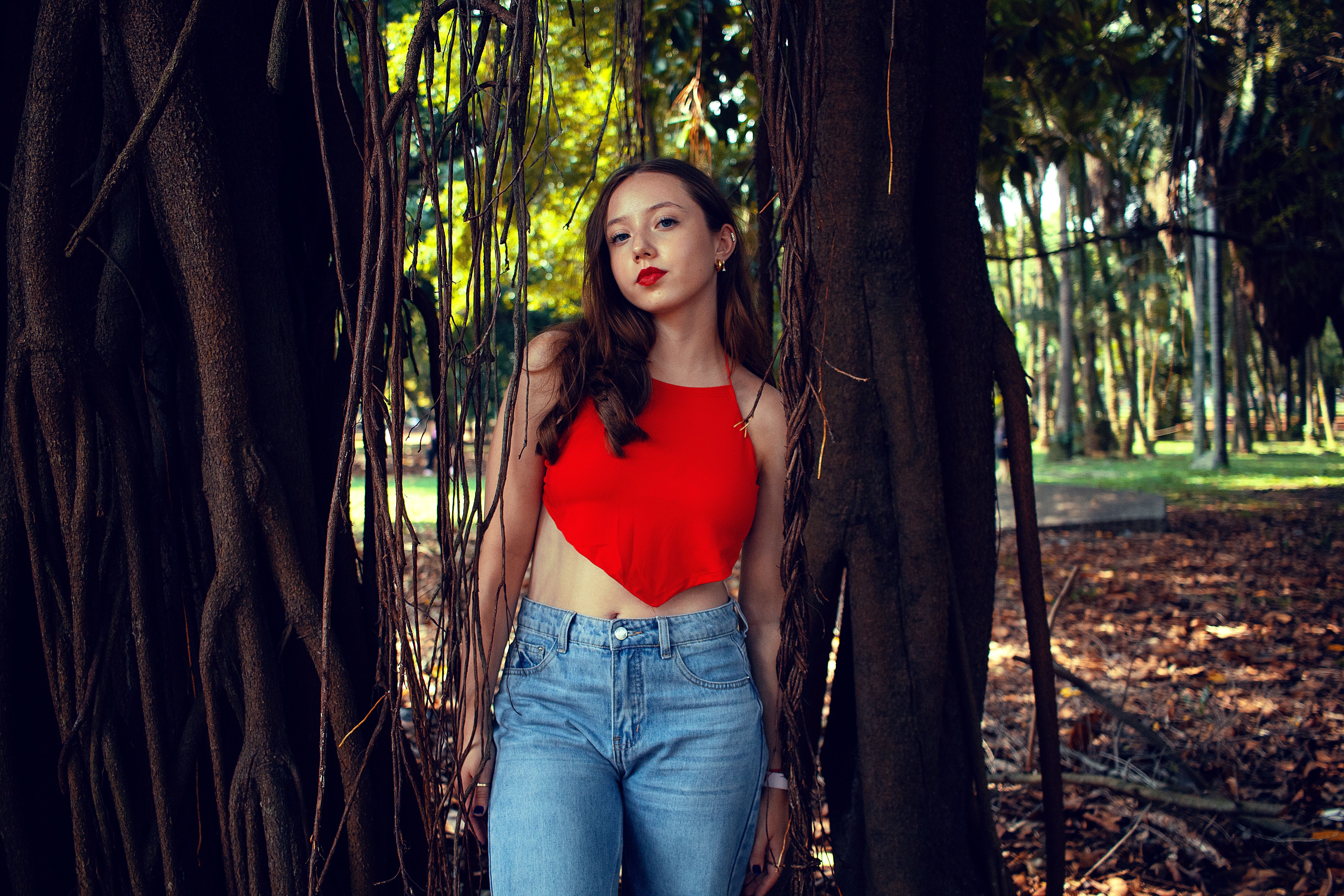 Woman Posing Among Trees in a Forest · Free Stock Photo