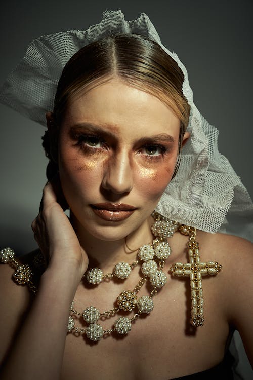 Woman in Necklace with Cross