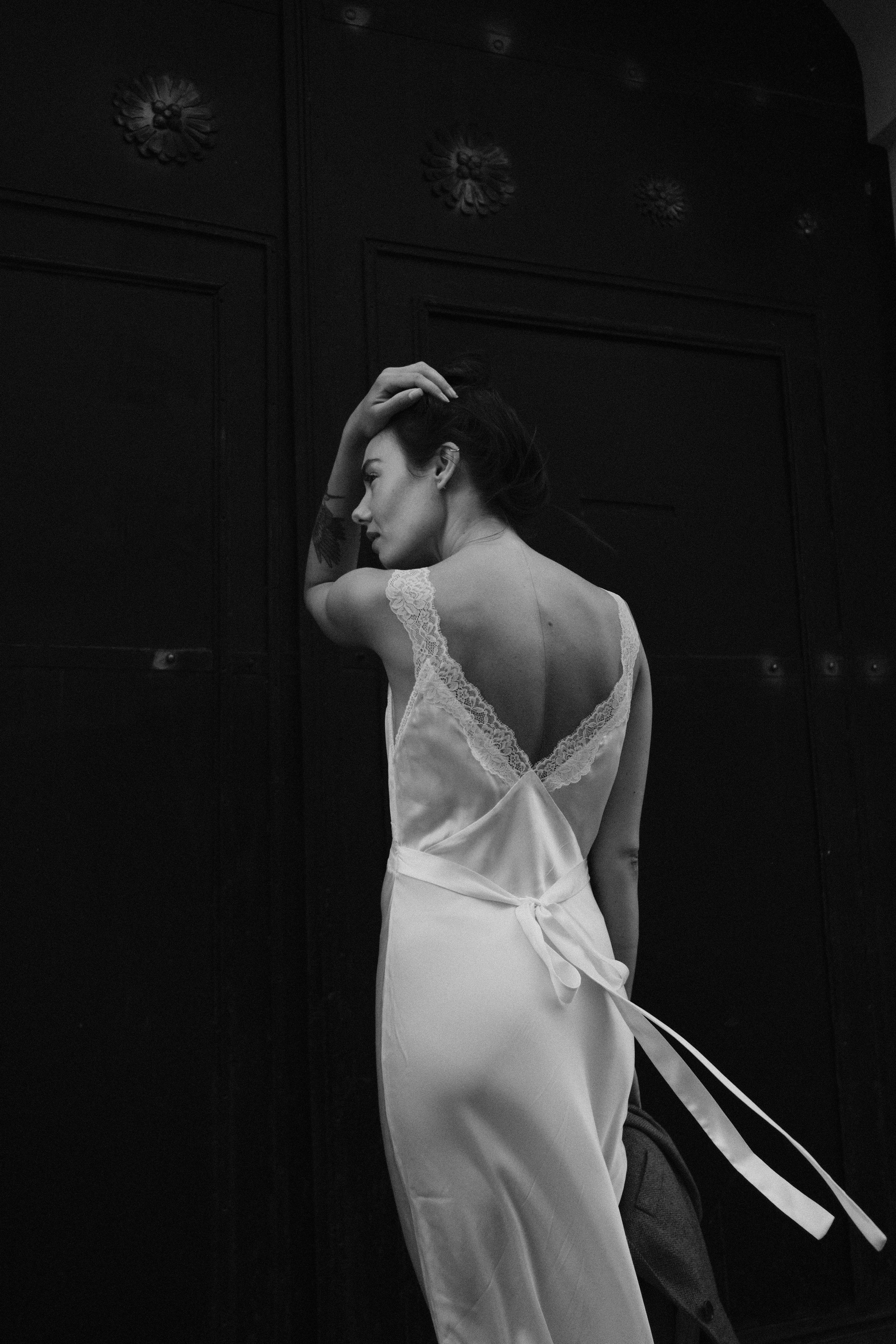 Black and White Photo of a Woman in a White Dress · Free Stock Photo