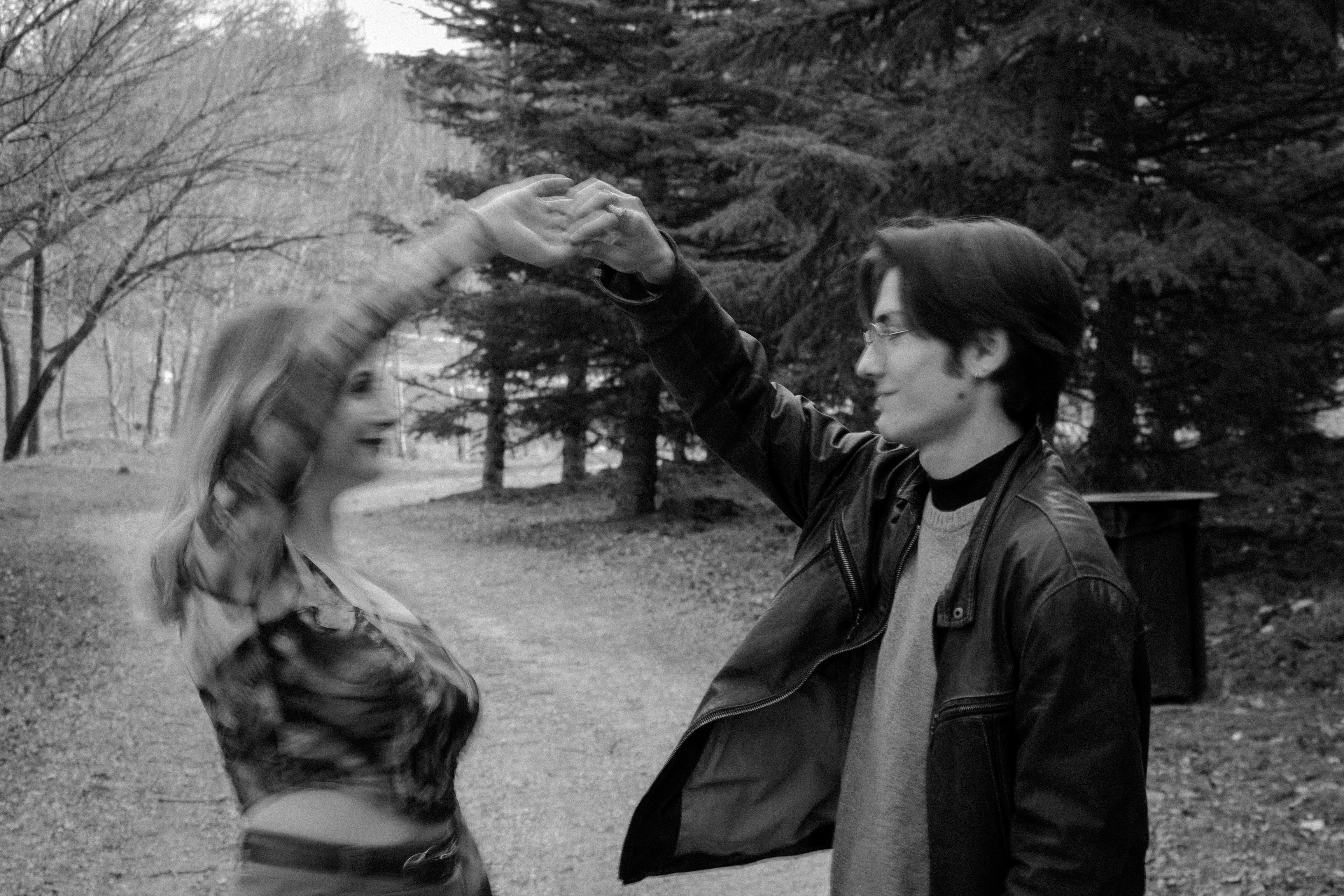 Couple Dancing on a Path in Black and White · Free Stock Photo