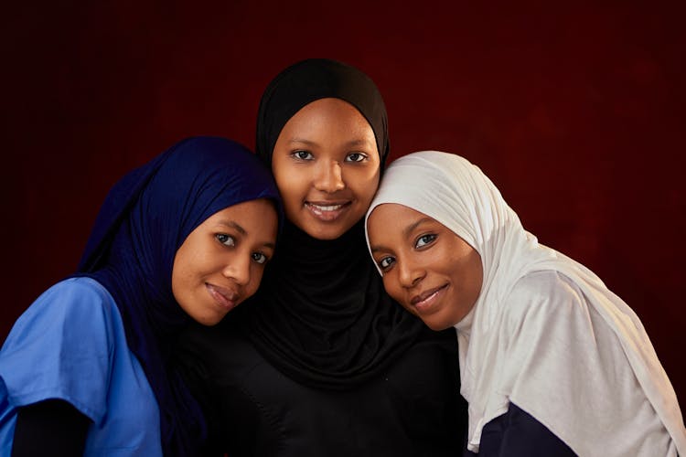 Smiling Women In Hijabs